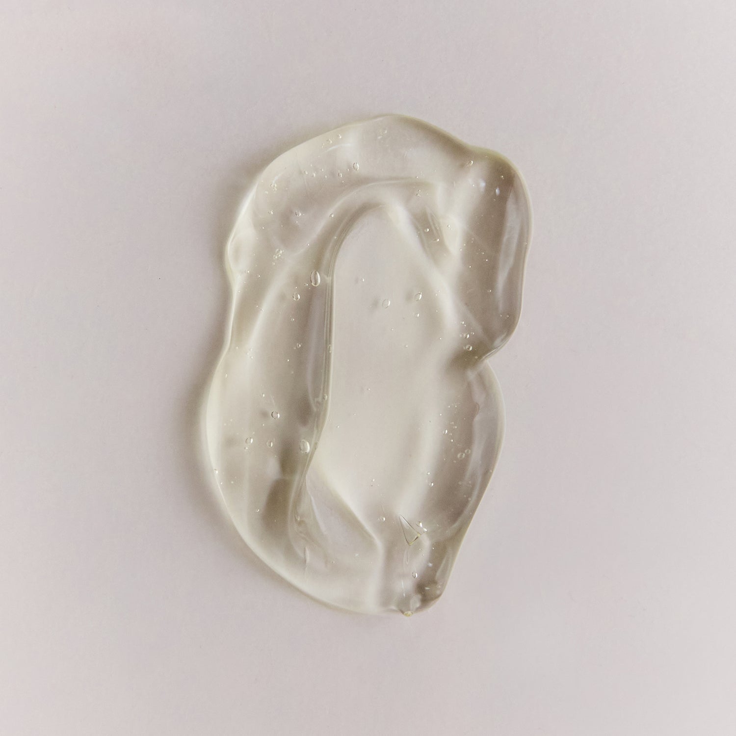 Close-up of Arch Aid Renewal Gel product texture on a soft neutral background